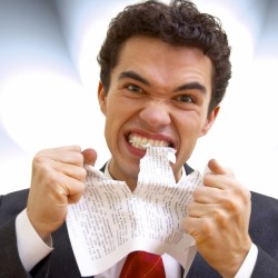 guy-eating-paper-in-frustration-small