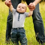 stock-footage-baby-boy-learns-to-walk-with-father