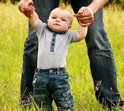 stock-footage-baby-boy-learns-to-walk-with-father.jpg