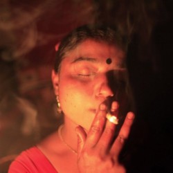 seventeen-year-old-hashi-smokes-cigarette-inside-her-room-before-she-serves-customer-kandapara