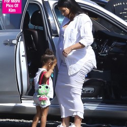 kim-kardashian-very-pregnant-opts-for-sneakers-lead