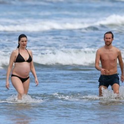 EXCLUSIVE: ** PREMIUM EXCLUSIVE RATES APPLY** **NO WEB UNTIL 9AM PST, JANUARY 5 **NO NY PAPERS** A bikini clad Anne Hathaway looks fantastic as she shows off her baby bump at the beach while spending Christmas and New year in Hawaii.