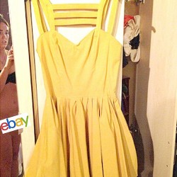 385949E000000578-3789313-A_woman_who_posted_a_photo_on_eBay_to_sell_her_yellow_dress_disp-a-6_1473926365658